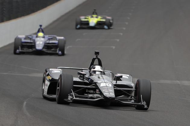 Ed Carpenter heads into the first turn during a practice session for the IndyCar Indianapolis 500 auto race at Indianapolis Motor Speedway, in Indianapolis Monday, May 21, 2018. (AP Photo/Michael Conroy)