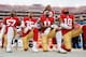 ORCHARD PARK, NY - OCTOBER 15: Eli Harold #58, Colin Kaepernick #7 and Eric Reid #35 of the San Francisco 49ers kneel in protest on the sideline, during the anthem, prior to the game against the Buffalo Bills at New Era Field on October 16, 2016 in Orchard Park, New York. The Bills defeated the 49ers 45-16. (Photo by Michael Zagaris/San Francisco 49ers/Getty Images)