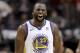 Golden State Warriors forward Draymond Green reacts after making a basket against the Houston Rockets during the second half in Game 5 of the NBA basketball playoffs Western Conference finals in Houston, Thursday, May 24, 2018. (AP Photo/David J. Phillip)