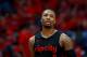 NEW ORLEANS, LA - APRIL 19: Damian Lillard #0 of the Portland Trail Blazers stands on the court during Game 3 of the Western Conference playoffs against the New Orleans Pelicans at the Smoothie King Center on April 19, 2018 in New Orleans, Louisiana. NOTE TO USER: User expressly acknowledges and agrees that, by downloading and or using this photograph, User is consenting to the terms and conditions of the Getty Images License Agreement. (Photo by Sean Gardner/Getty Images)