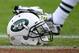 SANTA CLARA, CA - DECEMBER 11: A detailed view of the helmet belonging to a New York Jets player sitting on the field during pregame warm ups prior to playing the San Francisco 49ers in an NFL football game at Levi's Stadium on December 11, 2016 in Santa Clara, California. (Photo by Thearon W. Henderson/Getty Images)