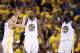OAKLAND, CA - MAY 26: Klay Thompson #11, Kevin Durant #35 and Draymond Green #23 of the Golden State Warriors celebrate after a play against the Houston Rockets during Game Six of the Western Conference Finals in the 2018 NBA Playoffs at ORACLE Arena on May 26, 2018 in Oakland, California. NOTE TO USER: User expressly acknowledges and agrees that, by downloading and or using this photograph, User is consenting to the terms and conditions of the Getty Images License Agreement. (Photo by Ezra Shaw/Getty Images)