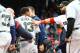 BOSTON, MA - MAY 27: Mitch Moreland #18 of the Boston Red Sox pats Ronald Acuna Jr. #13 of the Atlanta Braves on the back after an injury at first base in the seventh inning of a game at Fenway Park on May 27, 2018 in Boston, Massachusetts. (Photo by Adam Glanzman/Getty Images)