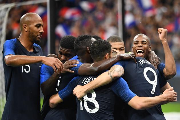 French forward Olivier Giroud celebrates with teammates after scoring a goal during the friendly football match between France and Ireland at the Stade de France stadium, in Saint-Denis, on the outskirts of Paris, on May 28, 2018. (Photo by FRANCK FIFE / AFP)        (Photo credit should read FRANCK FIFE/AFP/Getty Images)