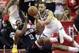 Houston Rockets guard James Harden (13) and Golden State Warriors guard Stephen Curry (30) scramble for a loose ball during the first half in Game 7 of the NBA basketball Western Conference finals, Monday, May 28, 2018, in Houston. (AP Photo/David Phillip)