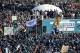 Fans cheer as a bus with team members arrives near the Philadelphia Museum of Art during a Super Bowl victory parade for the Philadelphia Eagles football team, Thursday, Feb. 8, 2018, in Philadelphia. The Eagles beat the New England Patriots 41-33 in Super Bowl 52. (AP Photo/Alex Brandon)