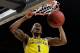 Michigan's Charles Matthews (1) dunks during the second half in the semifinals of the Final Four NCAA college basketball tournament against Loyola-Chicago, Saturday, March 31, 2018, in San Antonio. (AP Photo/David J. Phillip)