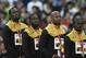 (L-R) Jamaica's gold medal winning team Usain Bolt, Nickel Ashmeade, Asafa Powell and Nesta Carter attend the victory ceremony for the men's 4x100 metres relay athletics event at the 2015 IAAF World Championships at the 'Bird's Nest' National Stadium in Beijing on August 30, 2015. AFP PHOTO / FRANCK FIFE (Photo credit should read FRANCK FIFE/AFP/Getty Images)