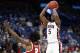 Auburn's Mustapha Heron (5) shoots over Alabama's Collin Sexton (2) during the first half in an NCAA college basketball quarterfinals game at the Southeastern Conference tournament Friday, March 9, 2018, in St. Louis. (AP Photo/Jeff Roberson)