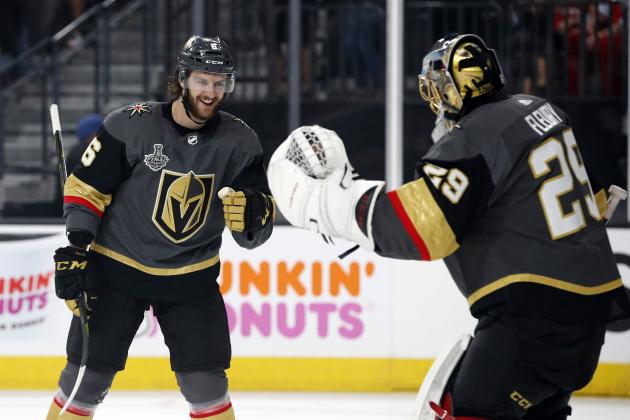 Vegas Golden Knights defenseman Colin Miller, left, celebrates his goal with goaltender Marc-Andre Fleury during first period in Game 1 of the NHL hockey Stanley Cup Finals against the Washington Capitals Monday, May 28, 2018, in Las Vegas. (AP Photo/John Locher)