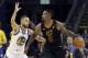   Cleveland Cavaliers guard JR Smith (5) is defended by Golden State Warriors guard Stephen Curry (30) during the first half of Game 1 of the NBA basketball finals in Oakland, California, on Thursday 31 May 2018. (AP Photo / Marcio Jose Sanchez) 