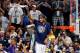 Villanova guard Mikal Bridges celebrates after cutting down the net after the championship game against Michigan in the Final Four NCAA college basketball tournament, Monday, April 2, 2018, in San Antonio. Villanova won 79-62. (AP Photo/Brynn Anderson)