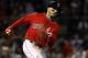 Boston Red Sox's Mookie Betts runs on an RBI double against the Baltimore Orioles during the fifth inning of a baseball game at Fenway Park in Boston Friday, May 18, 2018.(AP Photo/Winslow Townson)