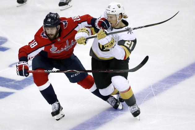 Washington Capitals forward Chandler Stephenson (18) contends with Vegas Golden Knights forward Cody Eakin (21) during the third period in Game 3 of the NHL hockey Stanley Cup Final, Saturday, June 2, 2018, in Washington. (AP Photo/Pablo Martinez Monsivais)