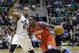 Philadelphia 76ers' Royal Ivey (7) drives against Utah Jazz's Randy Foye (8) in the first quarter during an NBA basketball game Monday, March 25, 2013, in Salt Lake City. (AP Photo/Rick Bowmer)