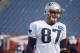 New England Patriots tight end Rob Gronkowski (87) walks on the field during NFL football practice, Tuesday, Jan. 9, 2018, at Gillette Stadium, in Foxborough, Mass. The Patriots are scheduled to host the Tennessee Titans in an AFC divisional NFL football playoff game on Saturday in Foxborough. (AP Photo/Steven Senne)