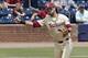 Florida State third baseman Drew Mendoza throws the ball to first base for an out during the second inning of an Atlantic Coast Conference NCAA college baseball tournament championship game against Louisville in Durham, N.C., Sunday, May 27, 2018. (AP Photo/Gerry Broome)