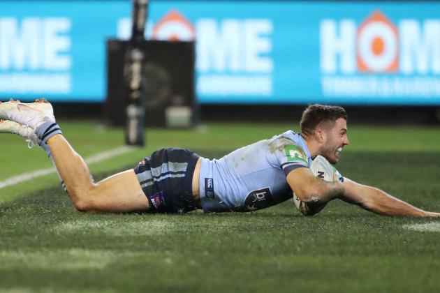 MELBOURNE, AUSTRALIA - JUNE 06:  James Tedesco of the Blues runs away to score a try during game one of the State Of Origin series between the Queensland Maroons and the New South Wales Blues at the Melbourne Cricket Ground on June 6, 2018 in Melbourne, Australia.  (Photo by Scott Barbour/Getty Images)