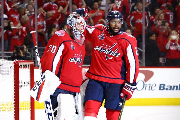WASHINGTON, DC - JUNE 04:  Braden Holtby #70 and Devante Smith-Pelly #25 of the Washington Capitals celebrate their team's 6-2 win over the Vegas Golden Knights in Game Four of the 2018 NHL Stanley Cup Final at Capital One Arena on June 4, 2018 in Washington, DC.  (Photo by Gregory Shamus/Getty Images)