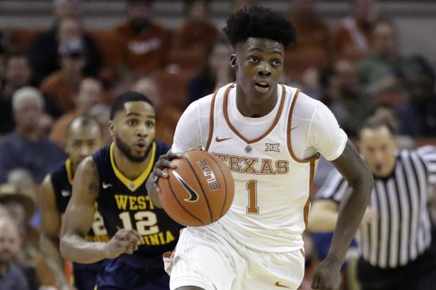 FILE - In this Jan. 14, 2017, file photo, Texas guard Andrew Jones (1) brings the ball up court during the second half of an NCAA college basketball game against West Virginia in Austin, Texas. The announcement that Jones was diagnosed with leukemia prompted concern and well wishes from across college basketball. He is now starting to offer glimpses of how he’s coping with his treatment, and sending “thank you” messages for the emotional and financial support that have poured in to help. (AP Photo/Eric Gay, File)