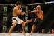 LAS VEGAS, NV - APRIL 23: (R-L) Demetrious Johnson kicks Henry Cejudo in their flyweight championship bout during the UFC 197 event inside MGM Grand Garden Arena on April 23, 2016 in Las Vegas, Nevada. (Photo by Christian Petersen/Zuffa LLC/Zuffa LLC via Getty Images)