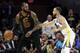 Cleveland Cavaliers' LeBron James is defended by Golden State Warriors' Stephen Curry during the first half of Game 4 of basketball's NBA Finals, Friday, June 8, 2018, in Cleveland. (AP Photo/Tony Dejak)