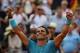 Spain's Rafael Nadal celebrates after victory over Austria's Dominic Thiem during their men's singles final match on day fifteen of The Roland Garros 2018 French Open tennis tournament in Paris on June 10, 2018. (Photo by Christophe ARCHAMBAULT / AFP) (Photo credit should read CHRISTOPHE ARCHAMBAULT/AFP/Getty Images)