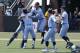 North Carolina players celebrate following an NCAA super regional college baseball game against Stetson in Chapel Hill, N.C., Saturday, June 9, 2018. North Carolina won 7-5 to advance to the College World Series. (AP Photo/Gerry Broome)