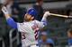 New York Mets first baseman Adrian Gonzalez (23) is shown in actin against the Atlanta Braves during a baseball game Tuesday, May 29, 2018, in Atlanta. (AP Photo/John Bazemore)