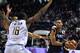 France's Elie Okobo (R) is challenged by Belgium's Kevin Tumba during the FIBA Basketball World Cup 2019 qualifying match between France and Belgium at the Palais des Sports Jean Weille in Nancy, eastern France, on February 25, 2018. / AFP PHOTO / JEAN-CHRISTOPHE VERHAEGEN (Photo credit should read JEAN-CHRISTOPHE VERHAEGEN/AFP/Getty Images)