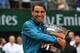 Spain's Rafael Nadal poses with the Mousquetaires Cup (The Musketeers) after his victory in the men's singles final match against Austria's Dominic Thiem, on day fifteen of The Roland Garros 2018 French Open tennis tournament in Paris on June 10, 2018. (Photo by Christophe ARCHAMBAULT / AFP) (Photo credit should read CHRISTOPHE ARCHAMBAULT/AFP/Getty Images)