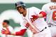 BOSTON, MA - MAY 20: Mookie Betts #50 of the Boston Red Sox reacts after hitting a double in the third inning of a game against the Baltimore Orioles at Fenway Park on May 20, 2018 in Boston, Massachusetts. (Photo by Adam Glanzman/Getty Images)