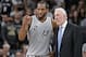 San Antonio Spurs forward Kawhi Leonard (2) talks with head coach Gregg Popovich during the second half of an NBA basketball game against the Oklahoma City Thunder, Saturday, March 12, 2016, in San Antonio. San Antonio won 93-85. (AP Photo/Darren Abate)
