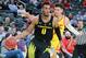 LAS VEGAS, NV - MARCH 09: Troy Brown #0 of the Oregon Ducks handles the ball against Jordan Usher #1 of the USC Trojans during a semifinal game of the Pac-12 basketball tournament at T-Mobile Arena on March 9, 2018 in Las Vegas, Nevada. (Photo by Leon Bennett/Getty Images)