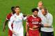 Liverpool's Egyptian forward Mohamed Salah (3rd R) is comforted by team members and Real Madrid's Portuguese forward Cristiano Ronaldo (2nd L) as he leaves the pitch after injury during the UEFA Champions League final football match between Liverpool and Real Madrid at the Olympic Stadium in Kiev, Ukraine on May 26, 2018. (Photo by Sergei SUPINSKY / AFP) (Photo credit should read SERGEI SUPINSKY/AFP/Getty Images)
