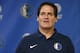 Dallas Mavericks owner Mark Cuban stands on stage before Cynthia Marshall, new interim CEO of the team, is introduced during a news conference, Monday, Feb. 26, 2018, in Dallas. Cuban has teased about the notion of running for president in 2020 in a campaign that could mirror President Donald Trump’s blend of reality TV and politics. But Cuban's political career could be quickly derailed by sexual harassment and misconduct allegations within his team. (AP Photo/Ron Jenkins)