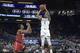 Cincinnati guard Jacob Evans (1) goes up for a shot in front of Houston guard Armoni Brooks (3) during the first half of an NCAA college basketball championship game at the American Athletic Conference tournament Sunday, March 11, 2018, in Orlando, Fla. (AP Photo/Phelan M. Ebenhack)