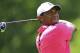 Tiger Woods follows his tee shot on the 18th hole during the third round of the Memorial golf tournament Saturday, June 2, 2018, in Dublin, Ohio. (AP Photo/David Dermer)