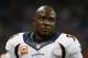 Denver Broncos outside linebacker DeMarcus Ware (94) watches from the bench against the Detroit Lions during the second half of an NFL football game, Sunday, Sept. 27, 2015, in Detroit. (AP Photo/Paul Sancya)