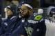 Seattle Seahawks free safety Earl Thomas sits on the bench in the second half of an NFL football game against the Los Angeles Rams, Sunday, Dec. 17, 2017, in Seattle. (AP Photo/Elaine Thompson)