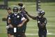 Baltimore Ravens quarterback Joe Flacco (5) watches quarterback Lamar Jackson throw a pass during an NFL football organized team activity at the team's headquarters in Owings Mills, Md., Thursday, May 31, 2018. (AP Photo/Patrick Semansky)