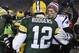 GREEN BAY, WI - NOVEMBER 30: Tom Brady #12 of the New England Patriots (R) congratulates fellow quarterback Aaron Rodgers #12 of the Green Bay Packers after their game at Lambeau Field on November 30, 2014 in Green Bay, Wisconsin. The Packers defeated the Patriots 26-21. (Photo by Brian D. Kersey/Getty Images)
