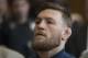 Irish Mixed Martial Arts fighter Conor McGregor looks on during his arraignment at the Kings County (Brooklyn) Criminal Court on April 6, 2018 in New York.
McGregor was charged with assault and criminal mischief by New York police on April 6, 2018 and was due to appear in court. The 29-year-old superstar reportedly surrendered at a Brooklyn police station late Thursday after allegedly attacking a shuttle bus loaded with fellow mixed martial arts fighters attending a New York media event at the Barclays Center stadium.Video footage showed McGregor hurling a dolly through a side window of the bus as it moved slowly in a parking lot at the stadium in Brooklyn.
/ AFP PHOTO / POOL / Mary Altaffer (Photo credit should read MARY ALTAFFER/AFP/Getty Images)