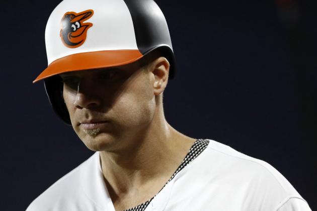 Baltimore Orioles' Chris Davis walks off the field after grounding out during a baseball game against the Boston Red Sox, Monday, June 11, 2018, in Baltimore. (AP Photo/Patrick Semansky)