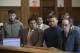 CORRECTS TO BROOKLYN CRIMINAL COURT, NOT BROOKLYN FEDERAL COURT-Ultimate fighting stars Conor McGregor, second from right, and Cian Cowley, left, stand with lawyers Jim Walden, right, and John Arlia during their arraignment in Brooklyn Criminal Court, Friday, April 6, 2018 in New York. McGregor is facing criminal charges in the wake of a backstage melee he allegedly instigated that has forced the removal of three fights from UFC's biggest card of the year. Video footage appears to show the promotion's most bankable star throwing a hand truck at a bus full of fighters after a Thursday news conference for UFC 223 at Brooklyn's Barclays Center. (AP Photo/Mary Altaffer, Pool)