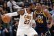 SALT LAKE CITY, UT - DECEMBER 30: LeBron James #23 of the Cleveland Cavaliers is defended by Donovan Mitchell #45 of the Utah Jazz in the second half of the 104-101 win by the Utah Jazz at Vivint Smart Home Arena on December 30, 2017 in Salt Lake City, Utah. NOTE TO USER: User expressly acknowledges and agrees that, by downloading and or using this photograph, User is consenting to the terms and conditions of the Getty Images License Agreement. (Photo by Gene Sweeney Jr./Getty Images)