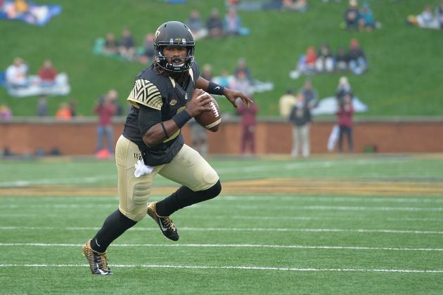 WINSTON SALEM, NC - OCTOBER 03:  Kendall Hinton #2 of the Wake Forest Demon Deacons in action against the Florida State Seminoles during their game at BB&T Field on October 3, 2015 in Winston Salem, North Carolina. Florida State won 24-16.  (Photo by Grant Halverson/Getty Images)