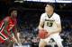 Missouri's Michael Porter Jr. looks to the basket as Georgia's Rayshaun Hammonds, left, defends during the first half in an NCAA college basketball game at the Southeastern Conference tournament Thursday, March 8, 2018, in St. Louis. (AP Photo/Jeff Roberson)