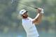 SOUTHAMPTON, NY - JUNE 14: Dustin Johnson of the United States takes his third shot on the fifth hole during the first round of the 2018 U.S. Open at Shinnecock Hills Golf Club on June 14, 2018 in Southampton, New York. (Photo by Warren Little/Getty Images)