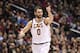 Cleveland Cavaliers forward Kevin Love (0) points after he scored during the second half of an NBA basketball game against the Washington Wizards, Sunday, Dec. 17, 2017, in Washington. The Cavaliers won 106-99. (AP Photo/Nick Wass)
